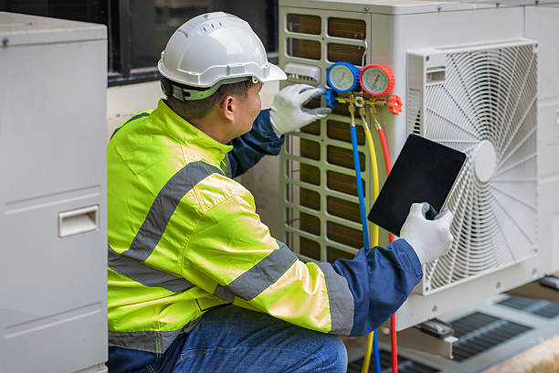 Professional Hvac technician working in Bronson, FL